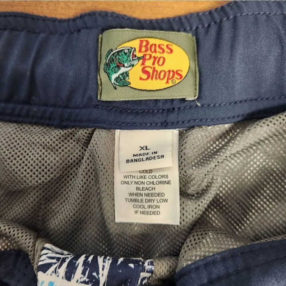 NWT Bass Pro Shops XL blue and palm leaf swim trunks.